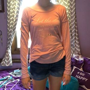 Pale pink long sleeve tee with writing